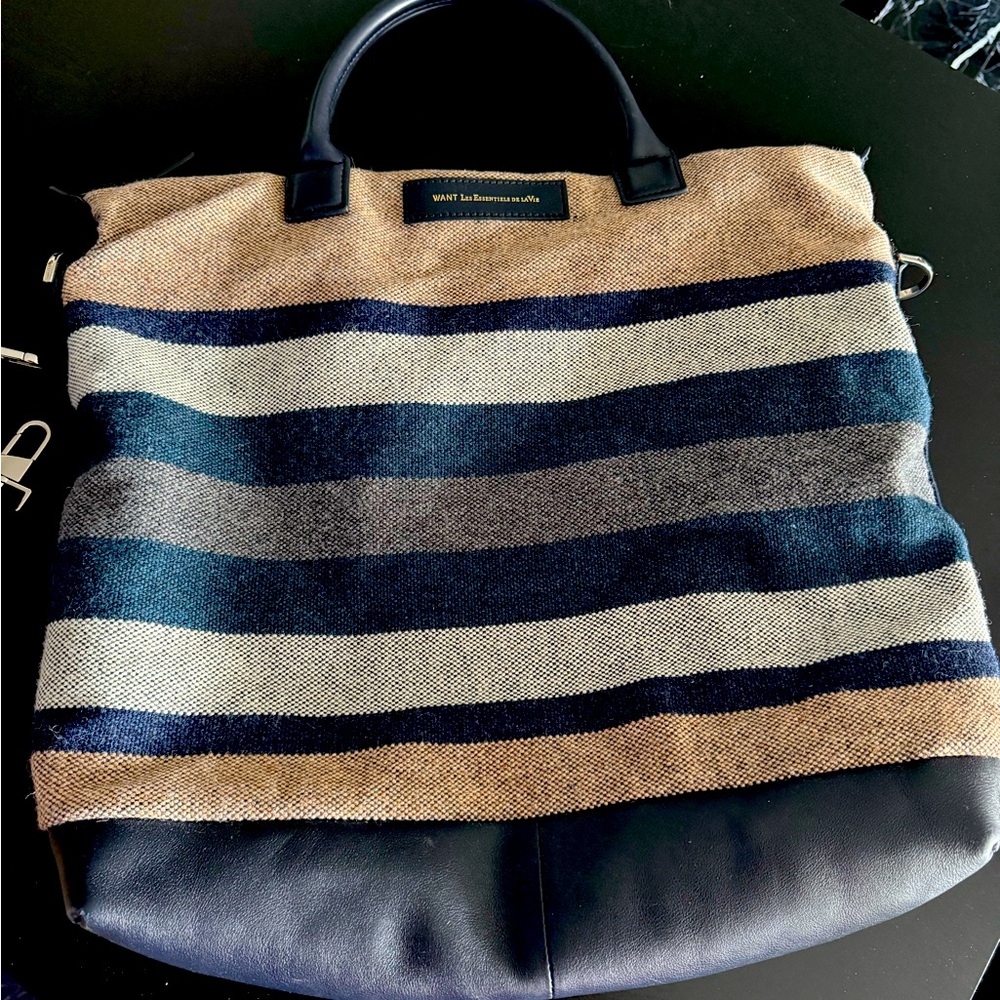 Barely used tote bag with shoulder strap.